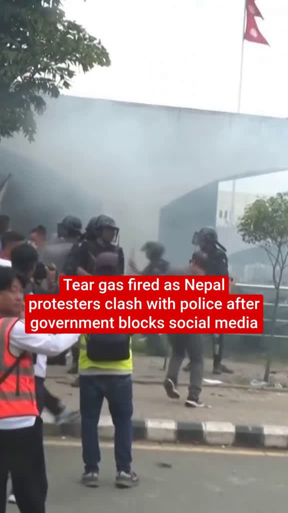 cover for Police fired tear gas at protesters during clashes as tens of thousands of people took to the streets of Nepal's capital on Monday (8 September) after authorities blocked most social media platforms including Facebook, X and Yo...
