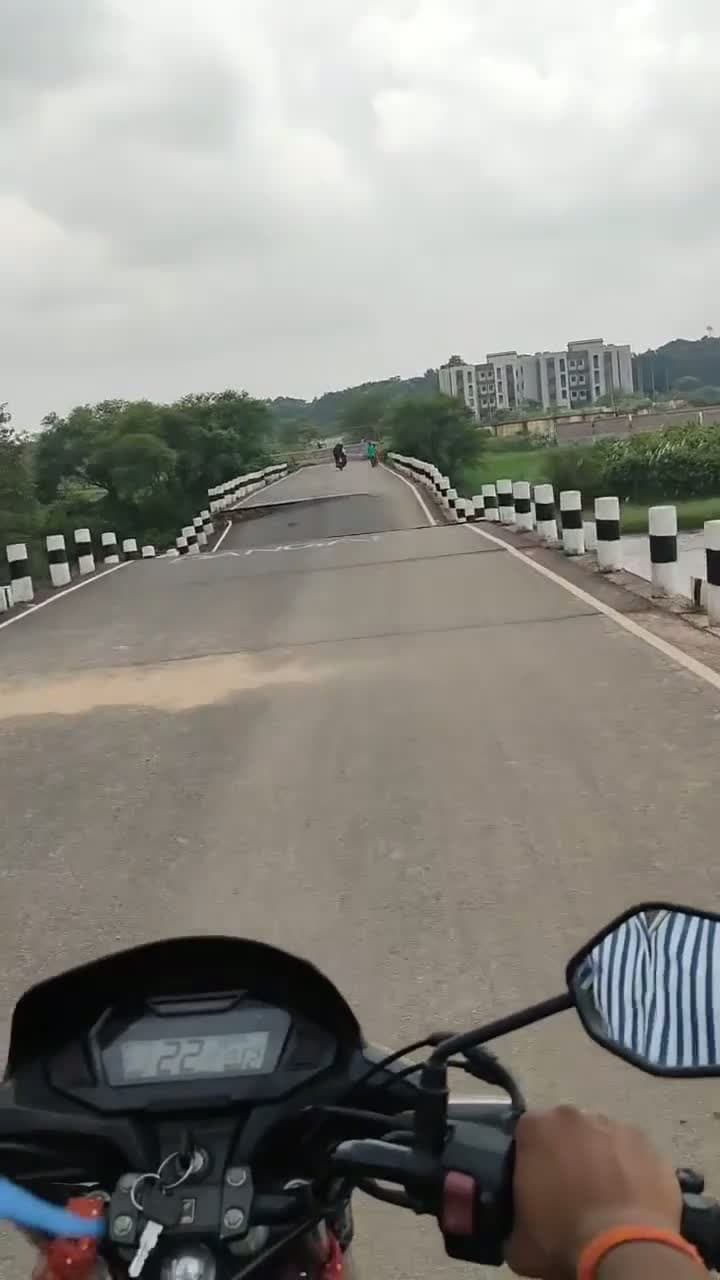 cover for Daring motorbike ride across a nearly broken bridge! 🏍️😱 #EpicRide #MotorbikeAdventure #BridgeChallenge
