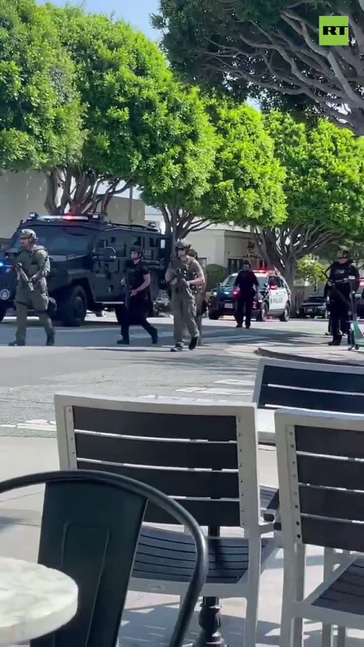 cover for Police Officer Shot! Armed cop CONVOY on Santa Monica streets! Police Still looking for gunman who SHOT officer!
