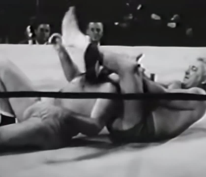 cover for Gorgeous George drops the Devil’s Kiss in 1949 — a vintage wrestling moment you won’t forget 👀 #GorgeousGeorge #WrestlingHistory #VintageWrestling #DevilsKiss