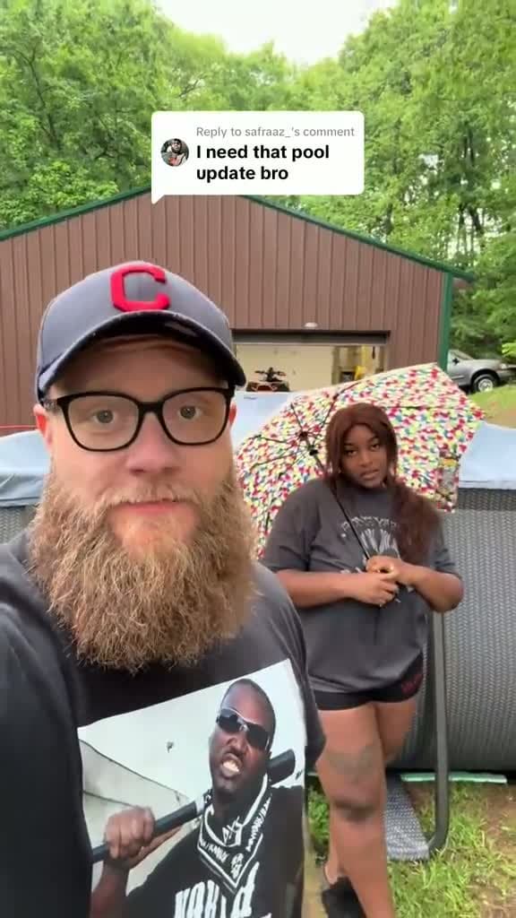 cover for Replying to @safraaz_ Put the pool up. Now it’s raining. Sako is not impressed. #marriedlife #couples #interracialcouple #westvirginia