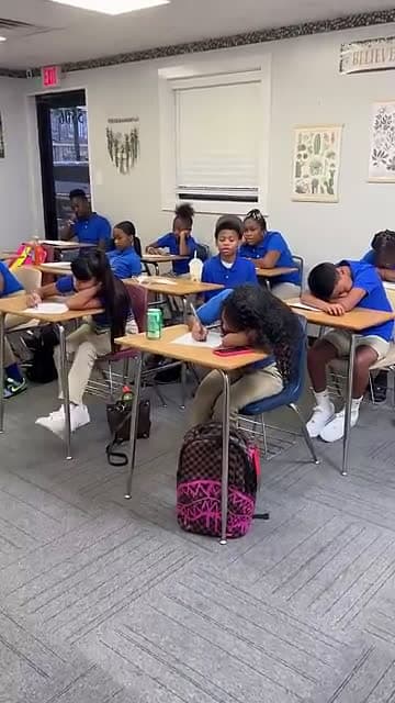 cover for Teacher makes sleepy kids warm up on first day of school shorts